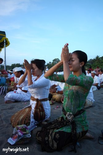 Praying in group at Petitenget beach